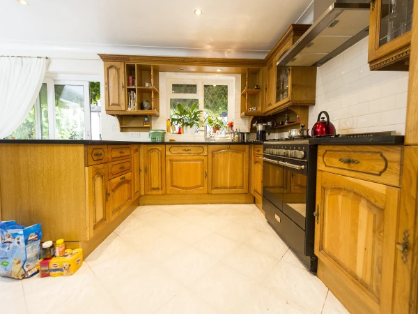 Before image of kitchen prior to modernisation, showing older cabinetry and layout before renovation update.