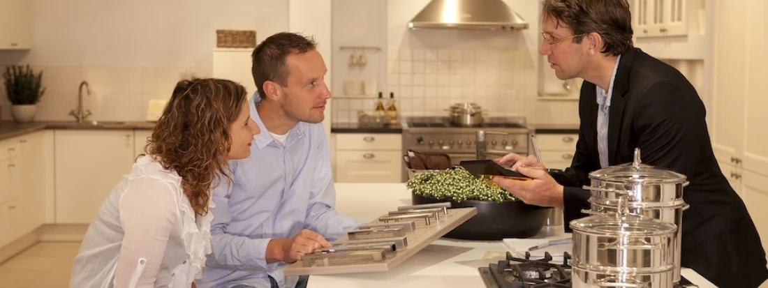Kitchen Magic representative talking with customers