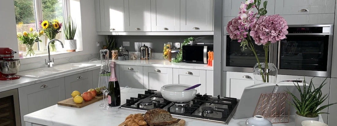 Complete modern grey kitchen with the finishing touches, featuring sleek cabinetry, stylish accents, and polished details.