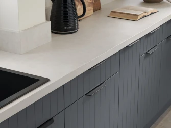 Windsor T&G Baslat Grey close up and white sparkle grain laminate worktop